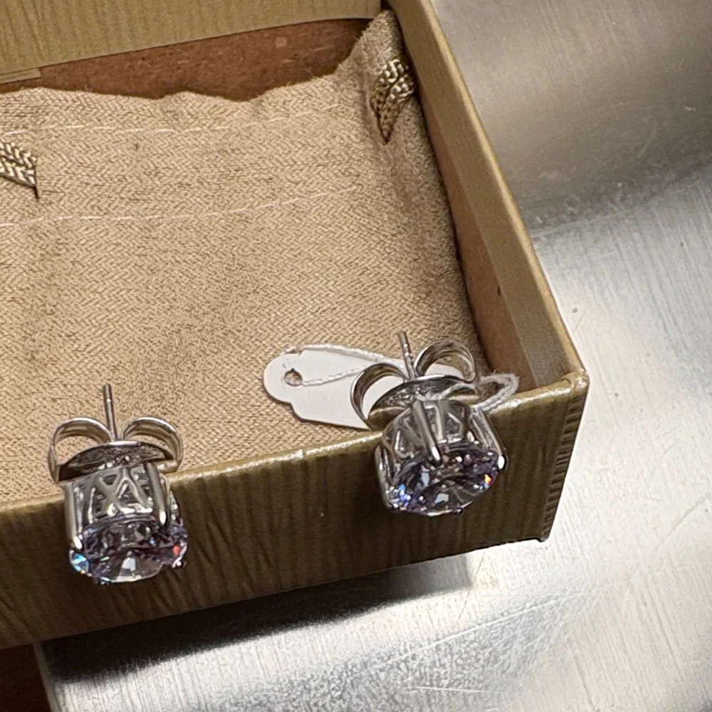 Elegant Silver Stud Earrings - Picture 3 of 10